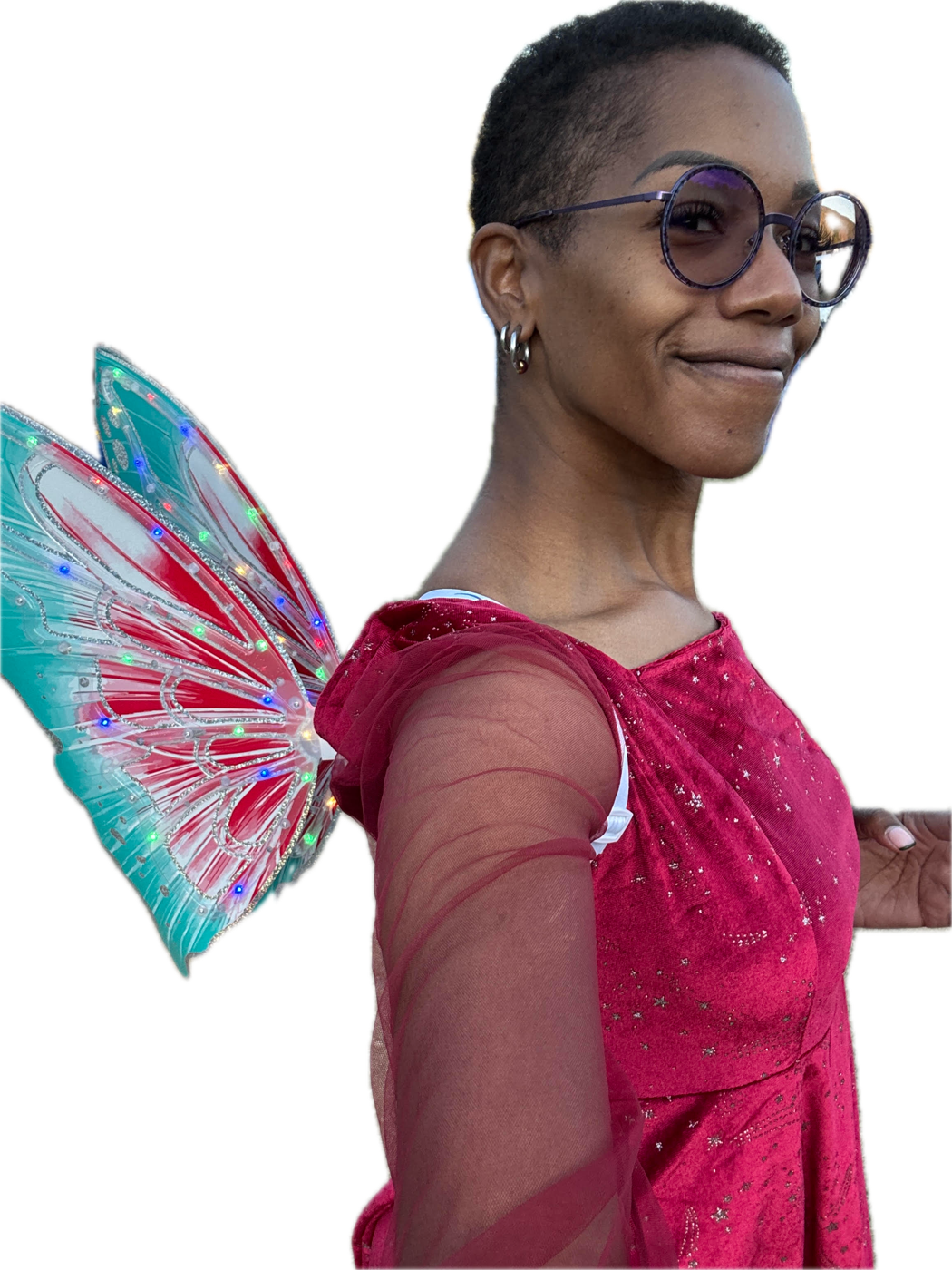 Antoinette wearing colorful illuminated wings